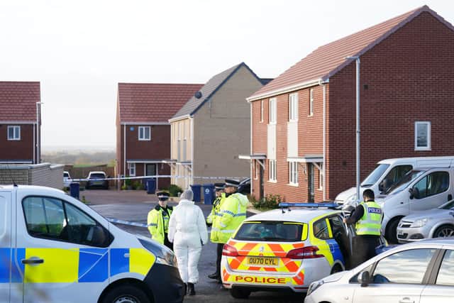 Police at the scene in Meridian Close, Bluntisham, where the body of a 32-year-old man was found (Photo: PA)