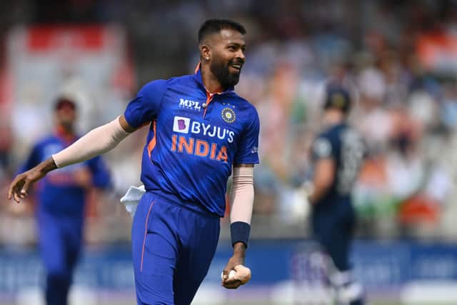 Hardik Pandya celebrates taking a catch off his own bowling against England in 2022