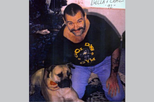 Charles Bronson with his dog Della during some time out from prison in 1992 (Photo: PA Picture Desk)
