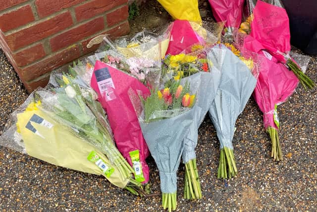Flowers left at the scene at The Row in Sutton, where police found the body of Gary Dunmore (Photo: PA)