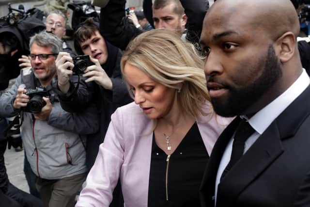 Adult film actress Stormy Daniels (Stephanie Clifford) arrives at the United States District Court Southern District of New York for a hearing related to Michael Cohen, President Trump's longtime personal attorney and confidante, April 16, 2018 in New York City.  Cohen and lawyers representing President Trump are asking the court to block Justice Department officials from reading documents and materials related to his Cohen's relationship with President Trump that they believe should be protected by attorney-client privilege. Officials with the FBI, armed with a search warrant, raided Cohen's office and two private residences last week. (Photo by Yana Paskova/Getty Images)