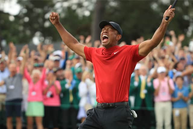 Tiger Woods celebrates on the 18th green after winning the Masters at Augusta National Golf Club on April 14, 2019. (Getty Images)