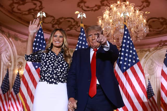 Former U.S. President Donald Trump and former first lady Melania Trump stand together during an event at his Mar-a-Lago home in November 2022 (Photo: Joe Raedle/Getty Images)