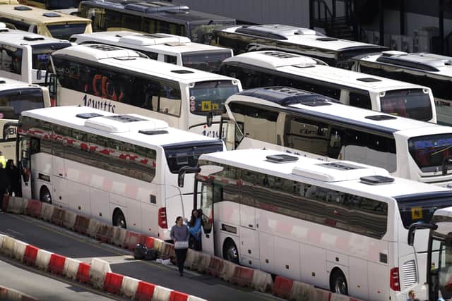 Coaches wait to enter the Port of Dover in Kent after extra sailings were run overnight to try and clear the backlog which has left passengers stuck in Easter traffic for hours. (Photo: PA/Andrew Matthews)