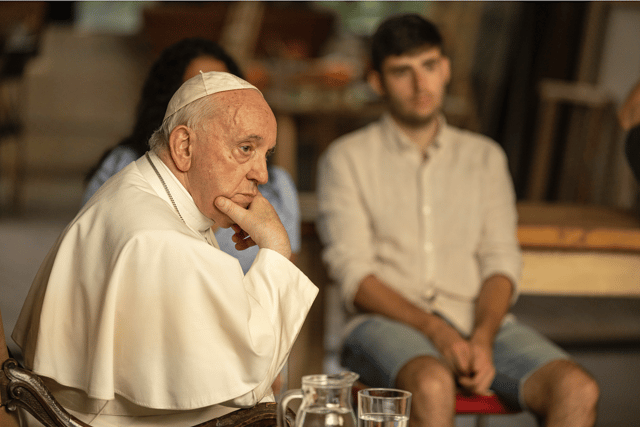 Pope Francis listens to the youth of Rome in The Pope Answers (Credit: Disney+)