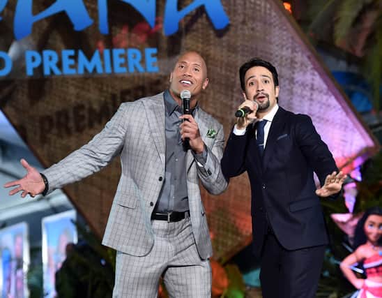 Actor Dwayne Johnson (L) and songwriter Lin-Manuel Miranda perform onstage at The World Premiere of DisneyÂs "MOANA" at the El Capitan Theatre on Monday, November 14, 2016 in Hollywood, CA.  (Photo by Alberto E. Rodriguez/Getty Images for Disney)