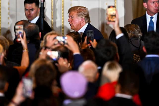 Former US president Donald Trump leaves after speaking during a press conference following his court appearance over an alleged ‘hush-money’ payment, at his Mar-a-Lago estate in Palm Beach, Florida, on April 4, 2023. (Photo by CHANDAN KHANNA/AFP via Getty Images)