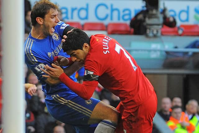 Luis Suarez was suspended for biting Branislav Ivanovic. (Getty Images)