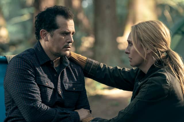 John Leguizamo as Rob and Toni Collette as Margot in The Power, eyes locked in the forest (Credit: Katie Yu/Prime Video)