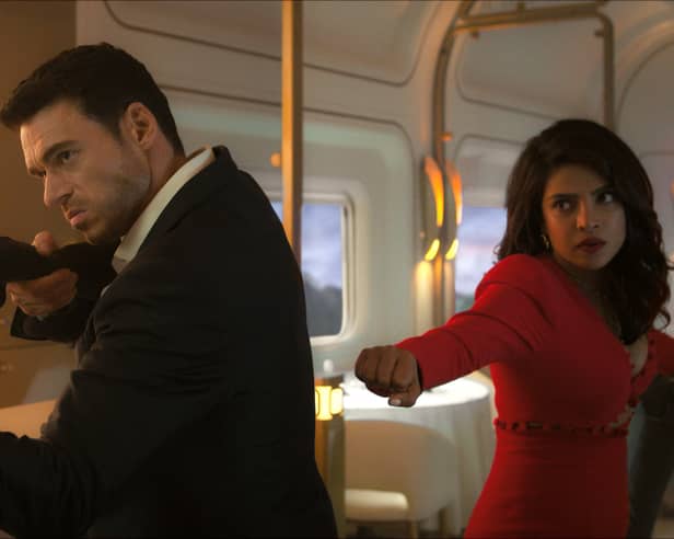 Richard Madden as Mason Kane and Priyanka Chopra Jonas as Nadia Sinh in Citadel, preparing for a fight in a train carriage (Credit: Amazon Prime Video)