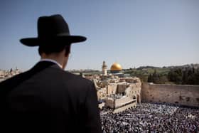 Thousands of Israelis attend the Annual Cohanim prayer, or Priest's blessing, for the Pesach (Passover) holiday, on April 9, 2012 at the Western Wall in Jerusalem's old city.