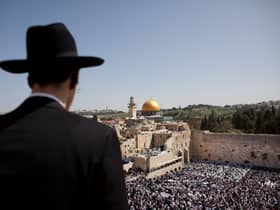 Thousands of Israelis attend the Annual Cohanim prayer, or Priest's blessing, for the Pesach (Passover) holiday, on April 9, 2012 at the Western Wall in Jerusalem's old city (Photo: Uriel Sinai/Getty Images)