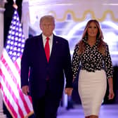 Former U.S. President Donald Trump and former first lady Melania Trump arrive for an event at his Mar-a-Lago home on November 15, 2022 in Palm Beach, Florida. Trump announced that he was seeking another term in office and officially launched his 2024 presidential campaign.  (Photo by Joe Raedle/Getty Images)