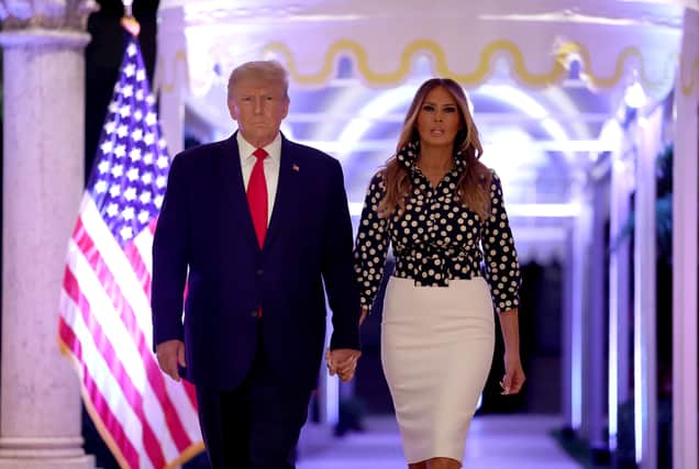 Former U.S. President Donald Trump and former first lady Melania Trump arrive for an event at his Mar-a-Lago home on November 15, 2022 in Palm Beach, Florida. Trump announced that he was seeking another term in office and officially launched his 2024 presidential campaign.  (Photo by Joe Raedle/Getty Images)
