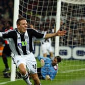 Craig Bellamy of Newcastle United celebrates after scoring the winning goal during the UEFA Champions League First Phase Group E match against Feyenoord. (Getty Images)