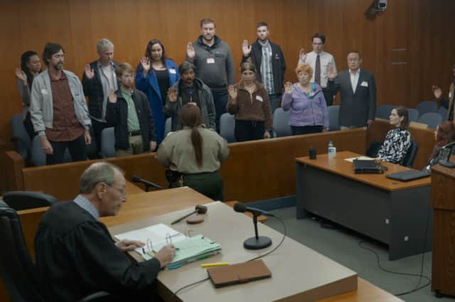 The jurors are sworn in on Jury Duty (Credit: Amazon Freevee)