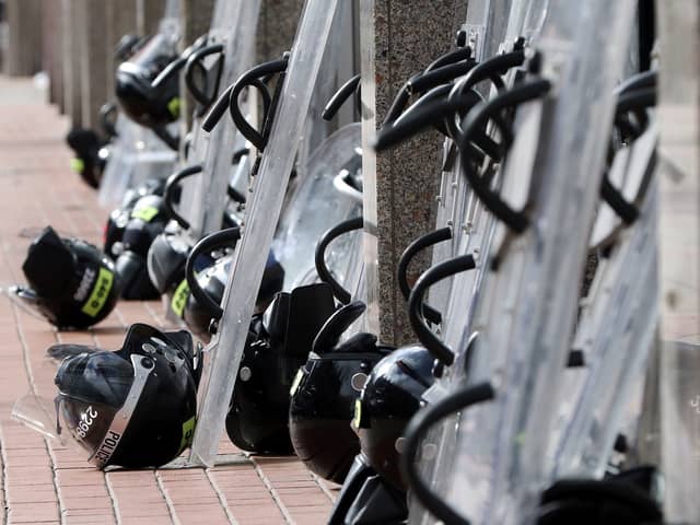 Police riot equipment pictured in Belfast, Northern Ireland during marches commemorating the 1916 Easter Rising in 2016 (Photo: PAUL FAITH/AFP via Getty Images) 