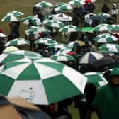 Heavy rain cause play to be suspended at The Masters. (Photo by Patrick Smith/Getty Images)