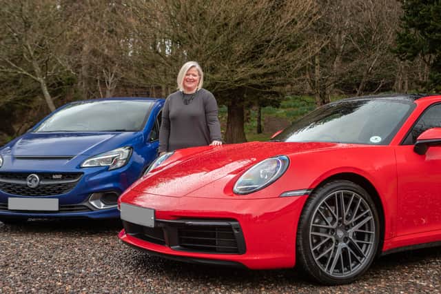 Joanne McGuigan has won a Porsche 911 Carrera 4 Coupe but has decided to stick with her Vauxhall Corsa. Picture: Omaze/PA