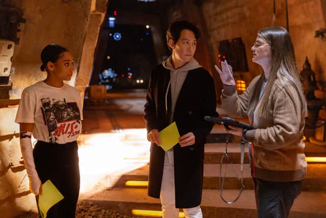 Amandla Stenberg, Lee Jung-jae, and director Leslye Headland on the set of The Acolyte (Credit: Christian Black / Lucasfilm)