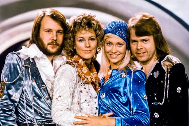 Picture taken in 1974 in Stockholm shows the Swedish pop group Abba with its members (L-R) Benny Andersson, Anni-Frid Lyngstad, Agnetha Faltskog and Bjorn Ulvaeus (Photo by OLLE LINDEBORG/AFP via Getty Images)