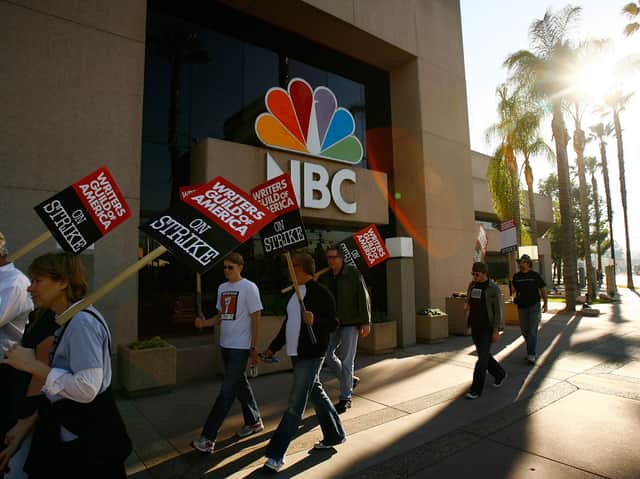 Writers Guild of America members and supporters picket in front of NBC studios during the 2008 strike (Credit: David McNew/Getty Images)