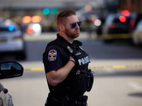 A police officer stands by at an active shooter incident near the Old National Bank building on April 10, 2023 in Louisville, Kentucky (Image: Getty)