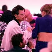 Harry Styles and Taylor Swift speak during the 65th Grammy Awards in 2023 (Photo: Frazer Harrison/Getty Images)
