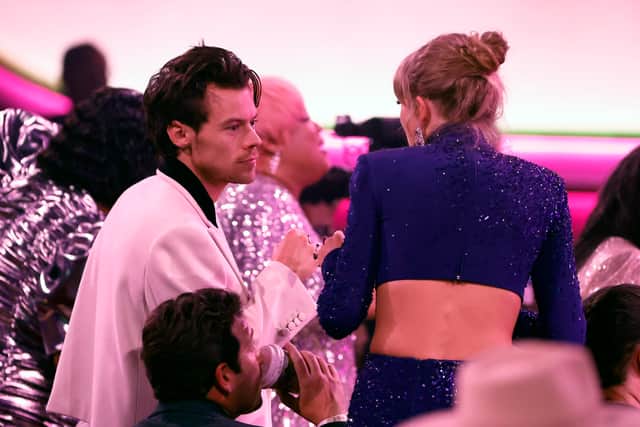 Harry Styles and Taylor Swift speak during the 65th Grammy Awards in 2023 (Photo: Frazer Harrison/Getty Images)