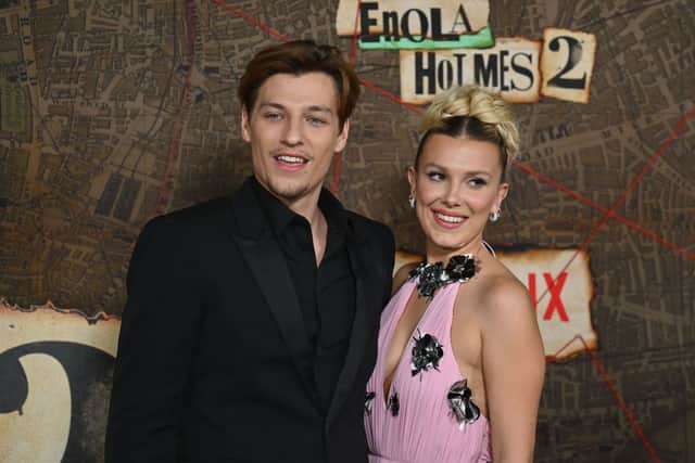 Jake Bongiovi and British actress Millie Bobby Brown arrive for the premiere of Netflix’s “Enola Holmes 2” at The Paris Theatre in New York City on October 27, 2022. (Photo by ANGELA WEISS/AFP via Getty Images)