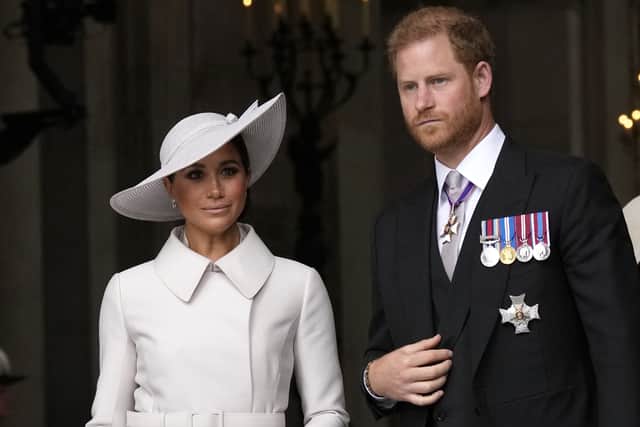 File photo dated 03/06/22 of the Duke and Duchess of Sussex leaving the National Service of Thanksgiving at St Paul’s Cathedral, London. Buckingham Palace has announced that the Duke of Sussex will attend the King Charles III’s Coronation but the Duchess of Sussex will remain in California with Prince Archie and Princess Lilibet. Credit: PA