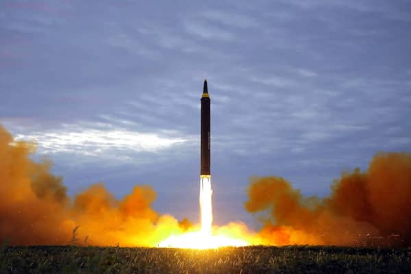 This picture from North Korea’s official Korean Central News Agency, taken on August 29, 2017, shows North Korea’s intermediate-range strategic ballistic rocket Hwasong-12 lifting off from the launching pad at an undisclosed location near Pyongyang. Credit: Getty Images