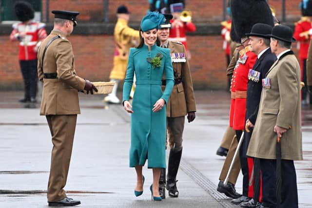 Kate Middleton looked chic in a teal Catherine Walker coat dress for St Patrick's Day 2023. Photograph by Getty