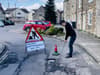 Man fed up with up ‘disgraceful’ potholes turns road into ‘crazy golf course’ to get council to act