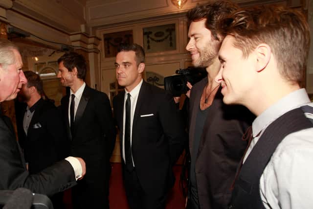 King Charles - then the Prince of Wales greets the members of Take That as he arrives to attend the Royal Variety Performance in 2010 (Photo: Eddie Keogh - WPA Pool/Getty Images)