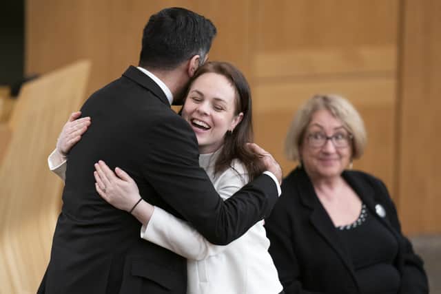 Humza Yousaf hugs Kate Forbes in the main chamber during the vote for the new First Minister at the Scottish Parliament in Edinburgh. Picture date: Tuesday March 28, 2023. Credit: PA