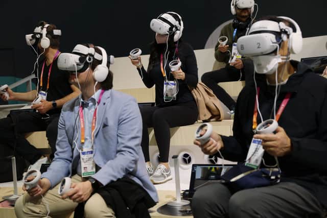 People use VR headsets to join the Metaverse. Credit: Alex Wong/Getty Images