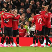 United celebrate Marcel Sabitzer’s second goal against Sevilla