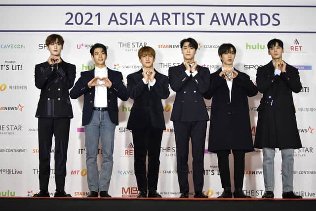 This picture taken on December 2, 2021 shows members of K-pop boy band Astro attending a red carpet event of the Asia Artist Awards in Seoul. - K-pop star Moonbin, a member of the boy band Astro, has died at the age of 25, his music label Fantagio announced on April 20, 2023. (Photo by Jung Yeon-je / AFP) (Photo by JUNG YEON-JE/AFP via Getty Images)