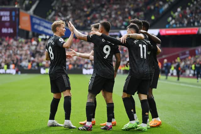 Gabriel Jesus and Martin Odegaard celebrate their goals in Premier League fixture against West Ham