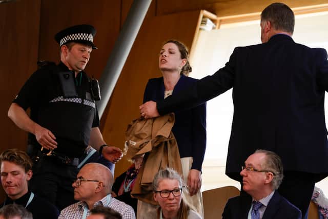 Protester once again disrupted FMQs in Holyrood. (Credit: Getty Images)