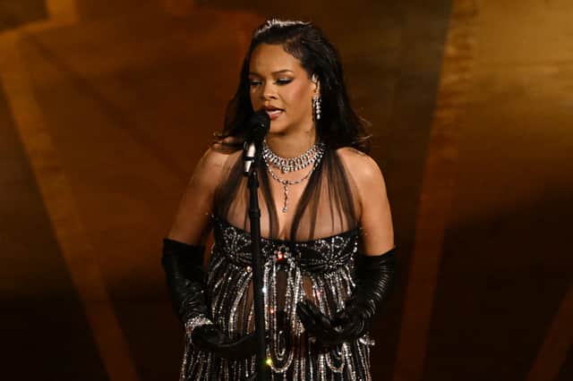Barbadian singer-songwriter, actress Rihanna performs "Lift Me Up" from "Black Panther: Wakanda Forever," onstage during the 95th Annual Academy Awards at the Dolby Theatre in Hollywood, California on March 12, 2023. (Photo by Patrick T. Fallon / AFP) (Photo by PATRICK T. FALLON/AFP via Getty Images)