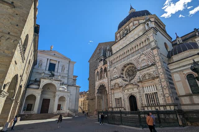  The Piazza Duomo is home to the Cattedrale di Sant'Alessandro Martire (left) and Basilica di Santa Maria Maggiore