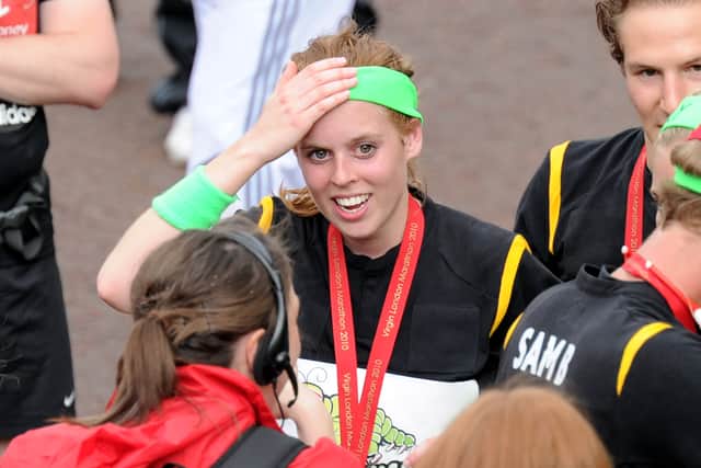 Princess Beatrice completes the Virgin London Marathon on April 25, 2010 in London, England. Princess Beatrice is competing as part of a 34 person human caterpillar. on April 25, 2010 in London, England.  (Photo by Gareth Cattermole/Getty Images)