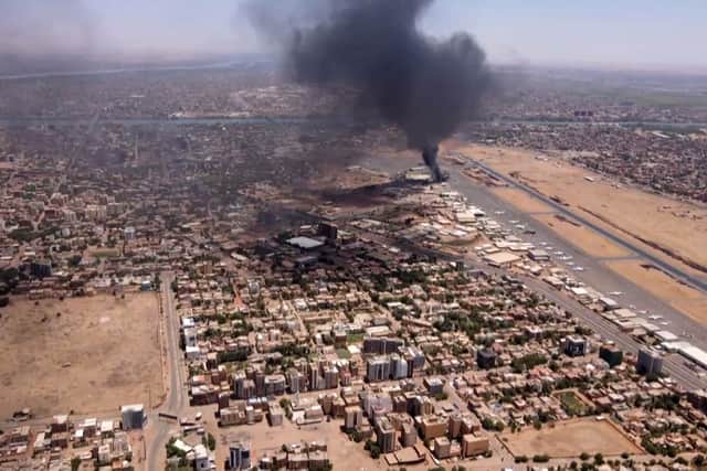 Aerial view of black smoke rising above the Khartoum International Airport amid ongoing battles. Picture: AFP via Getty Images