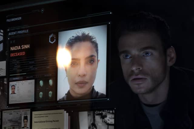 Richard Madden as Kyle Conroy in Citadel, looking at a picture of Nadia Sinh and trying to remember his life as Mason Kane (Credit: Prime Video)