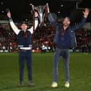 McElhenney and Reynolds lift the National League trophy on Saturday 