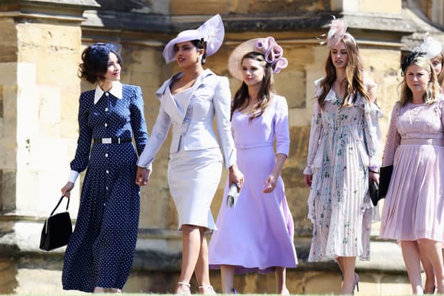 Abigail Spencer (L) and Priyanka Chopra (2L) arrive for the wedding ceremony of Britain's Prince Harry, Duke of Sussex and US actress Meghan Markle at St George's Chapel, Windsor Castle, in Windsor, on May 19, 2018. (Photo by Chris Jackson / POOL / AFP)        (Photo credit should read CHRIS JACKSON/AFP via Getty Images)
