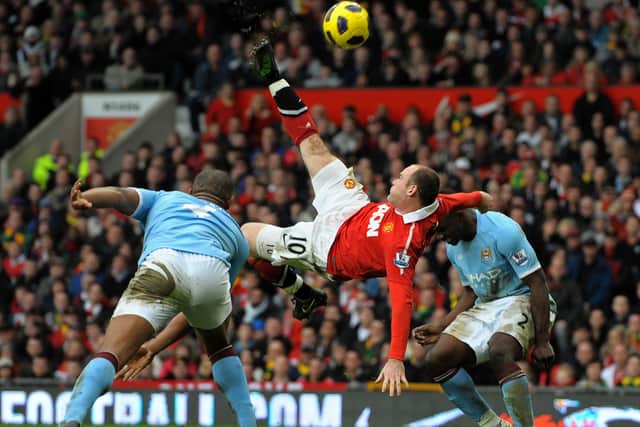 Wayne Rooney helped Manchester United to three points against Man City with a late overhead kick. (Getty Images)