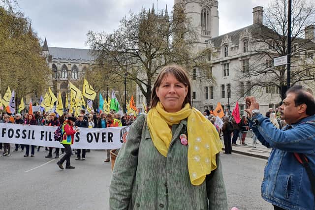 Climate activist George, from Guildford, travelled down to Westminster to take part in the march to “end fossil fuels”. (Photo: Isabella Boneham/NationalWorld) 
